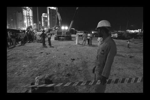 The scene in February 2008 after a bridge under construction collapsed on a site in Dubai Marina, killing seven Indian workers